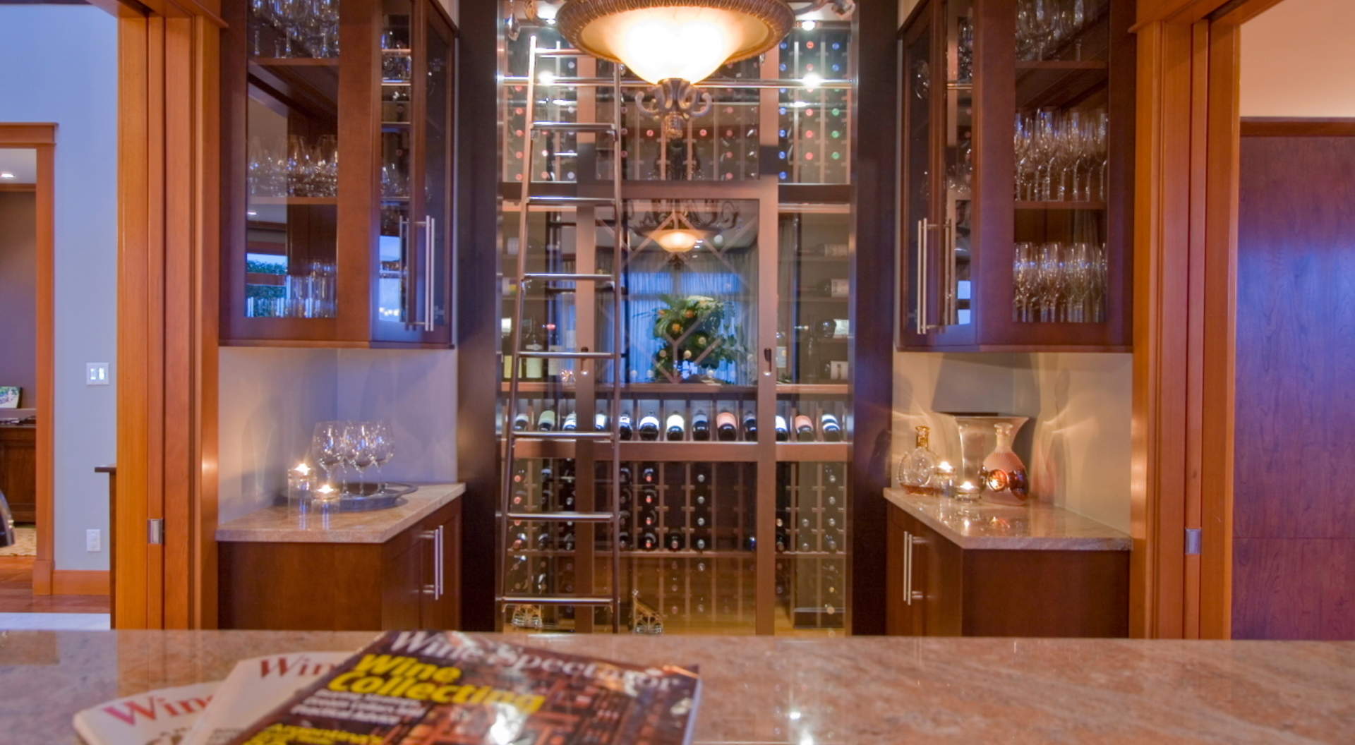 Main Floor Wet Bar with Refrigerated Wine Wall and Fully Stocked Prep Area