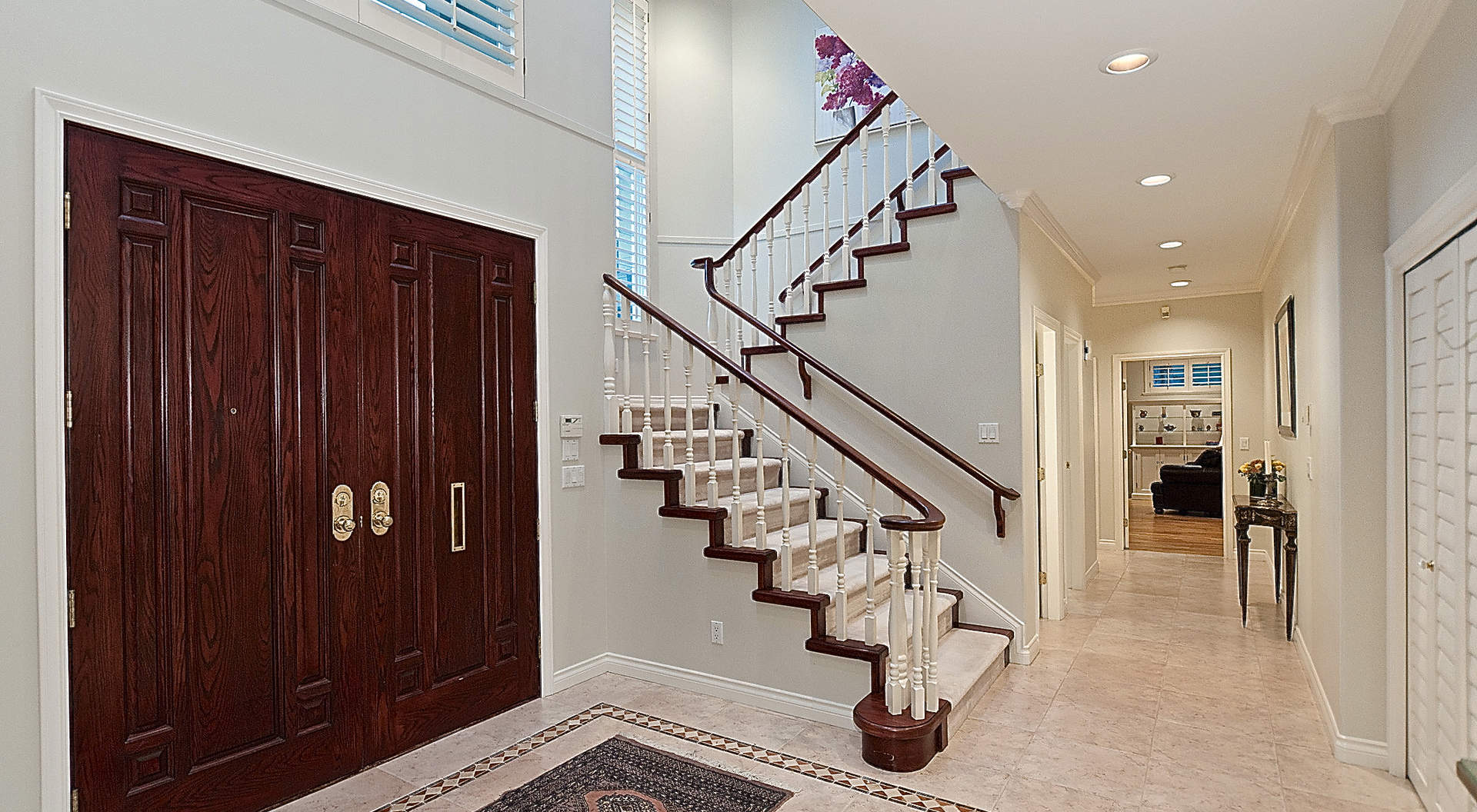 Double Height Main Foyer ith Central Staircase