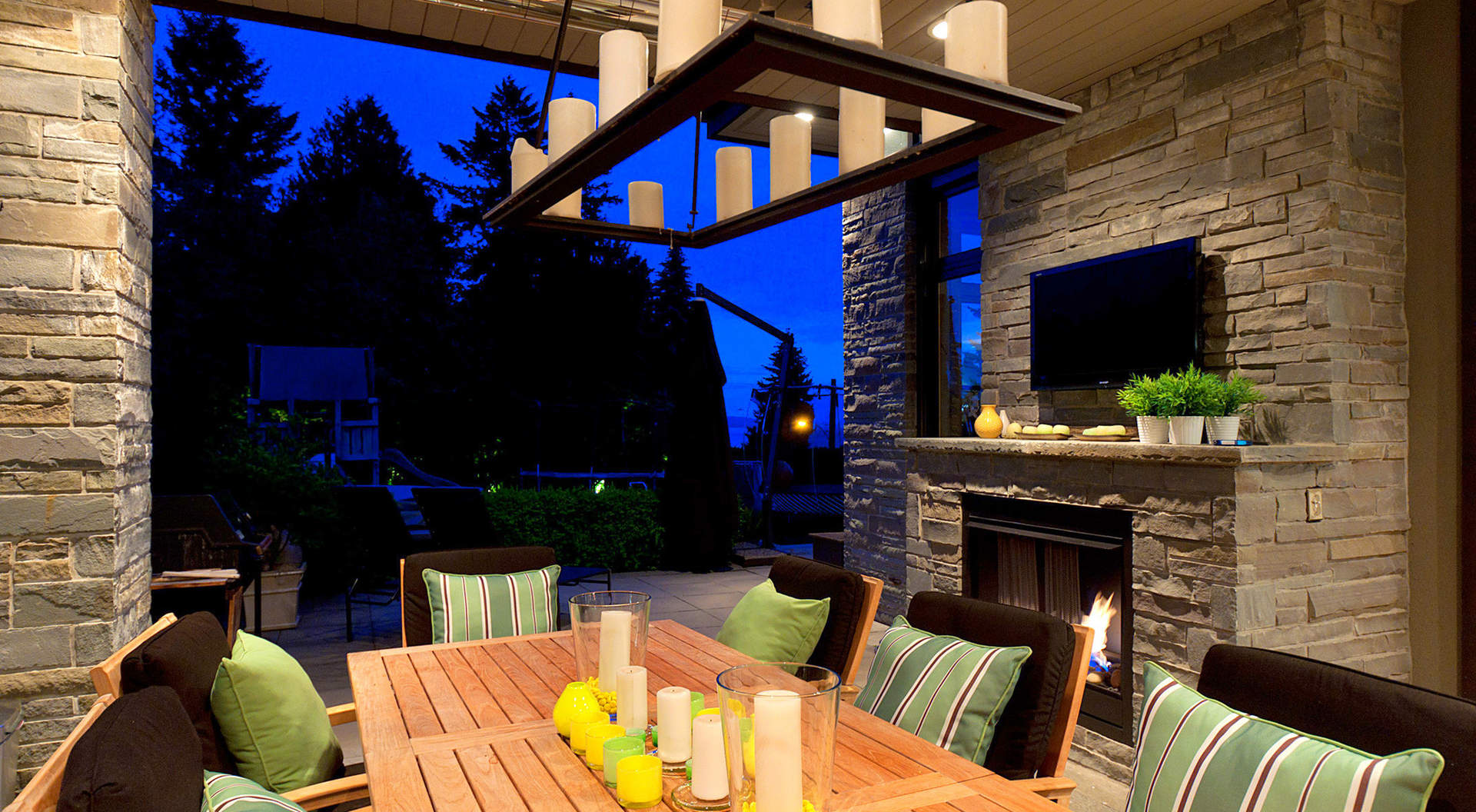 Covered Outdoor Living Area with BBQ Center and Fireplace