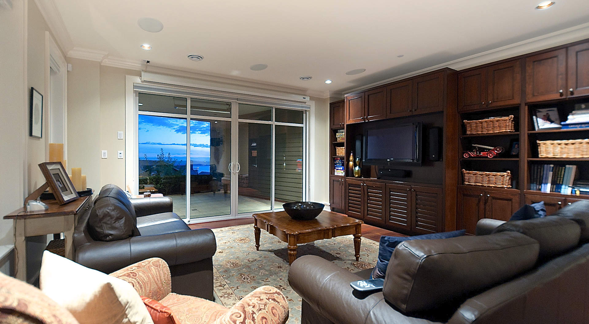 Lower Theatre Room with Fully Finished Cabinetry