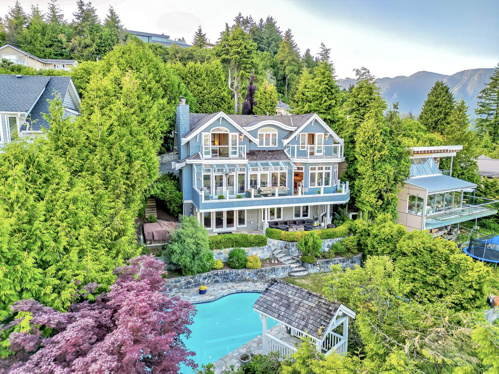 Sentinel Hill south-facing property featuring stunning Mt. Baker, Lion’s Gate Bridge, City & Ocean views. 