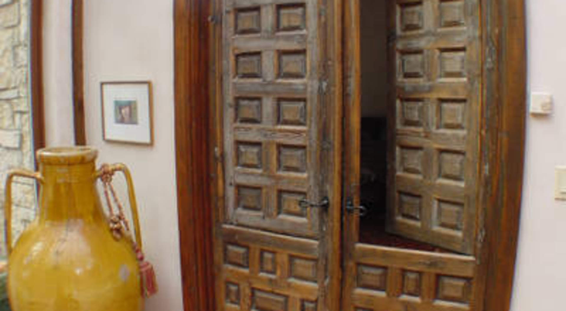 Unique 200 Year Old Doors to Master Bedroom