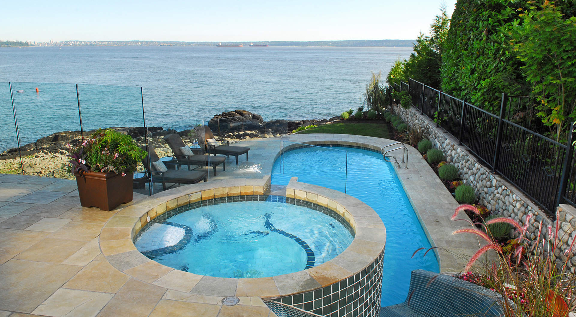 Spectacular Seaside Pool and Hot Tub with Water Slide