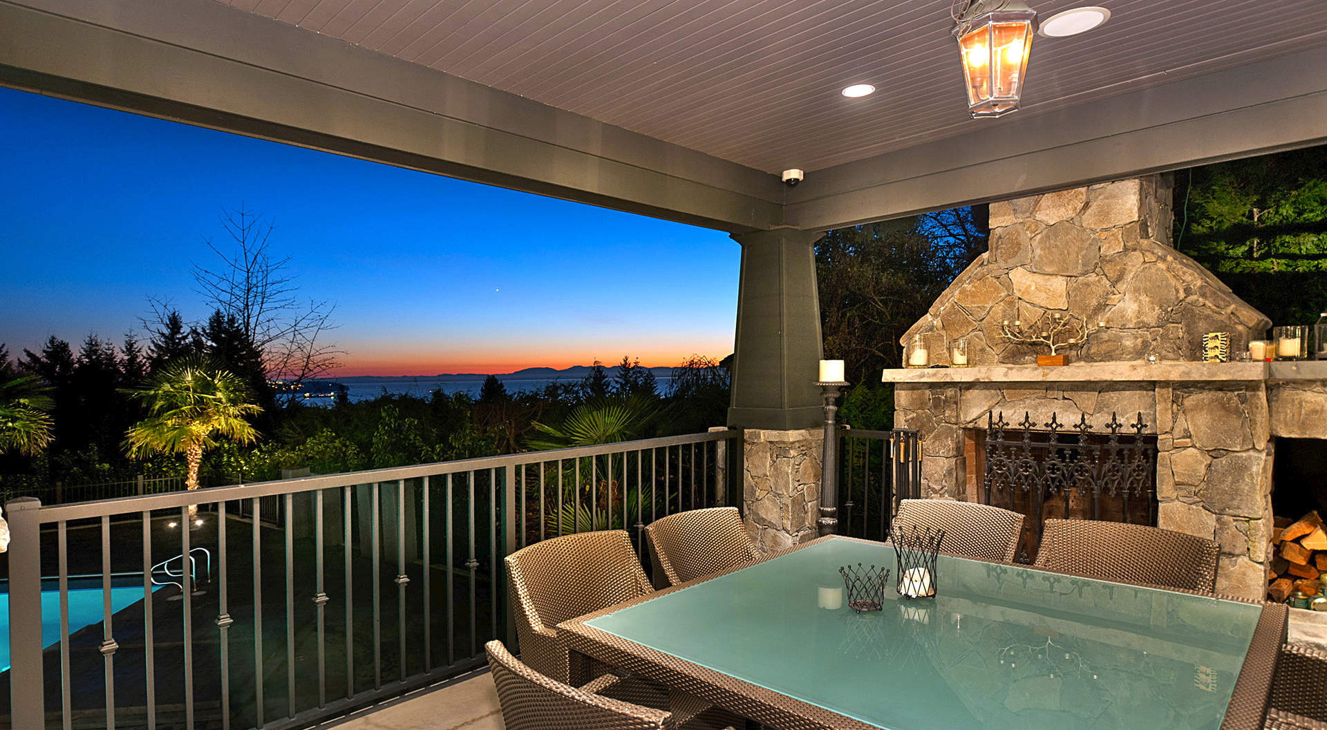 Covered Terrace with Stone Fireplace